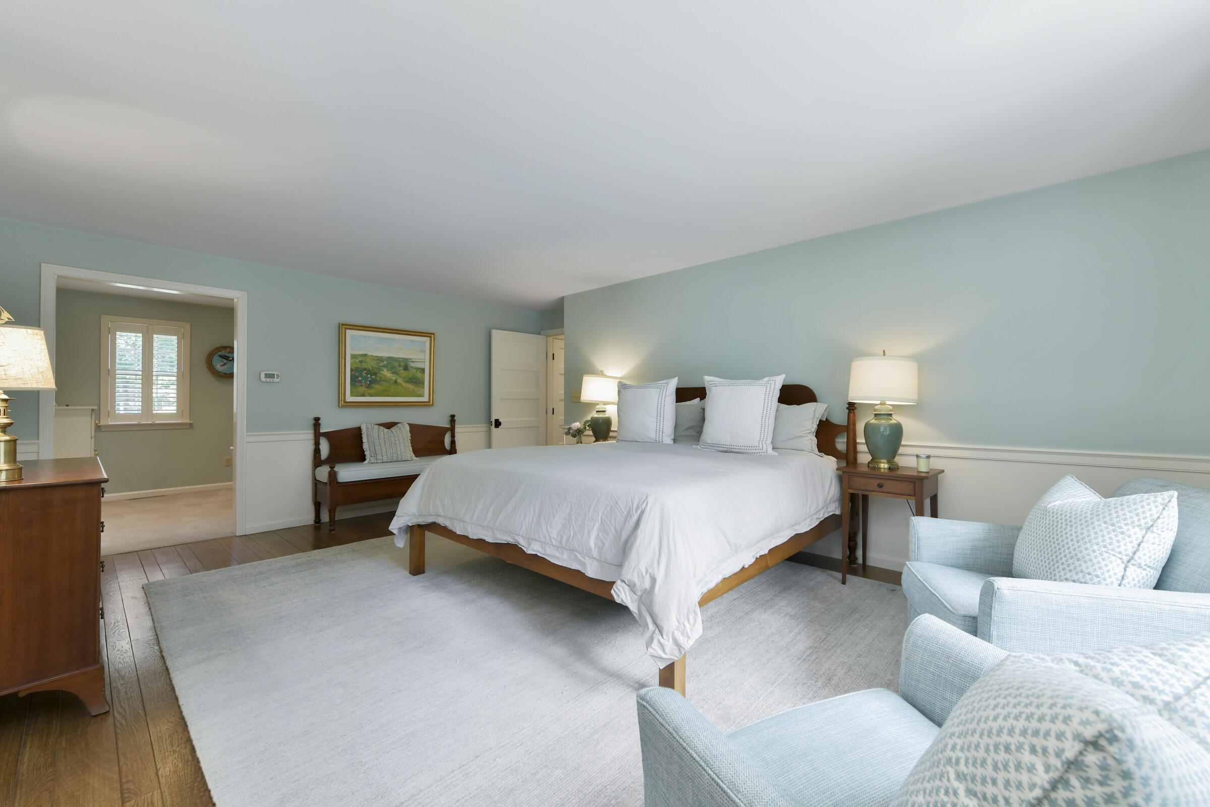 175 Starboard Lane Osterville, MA 02655 - Photo 28 of 39 a spacious bedroom with a bed and wooden floor