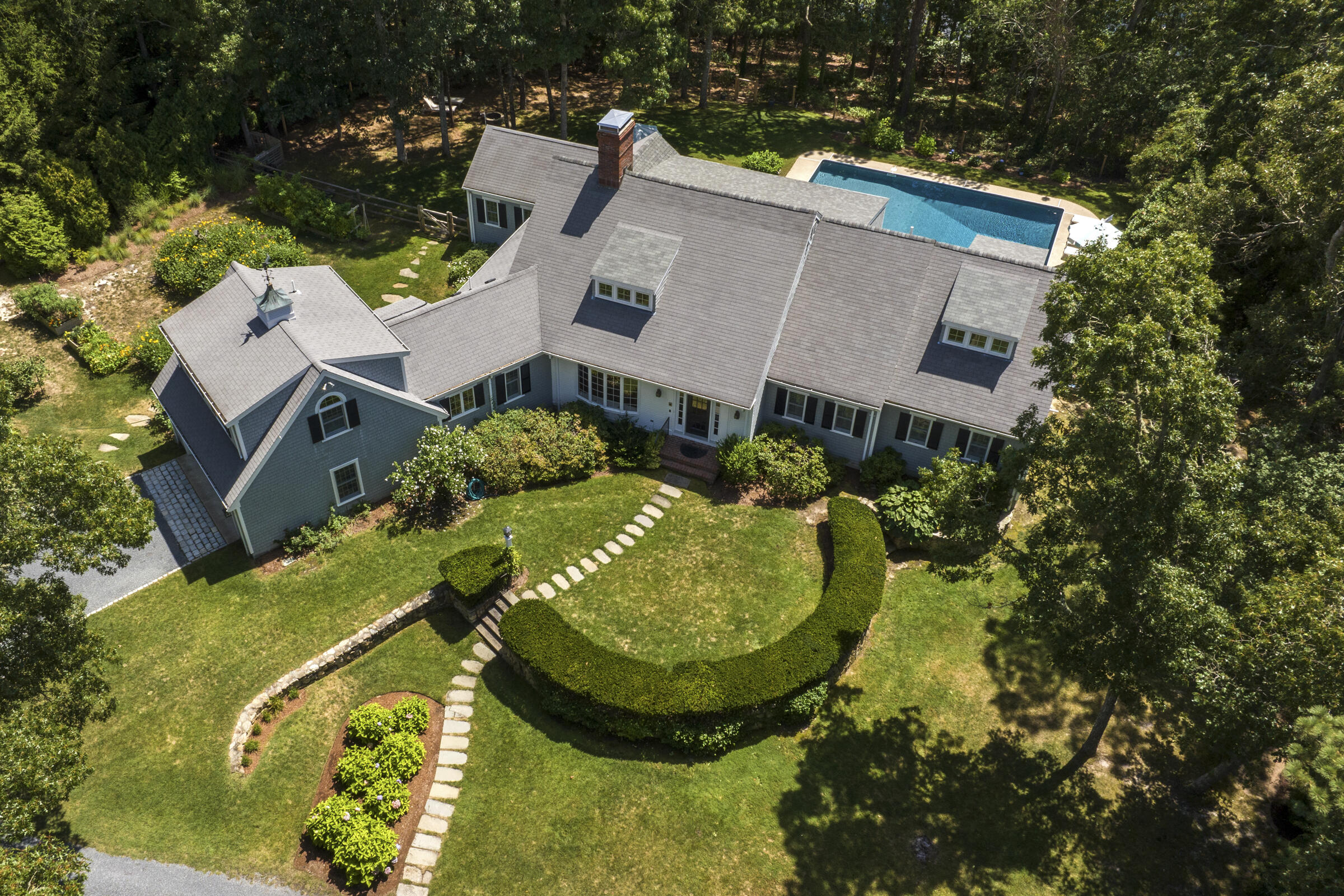 175 Starboard Lane Osterville, MA 02655 - Photo 3 of 39 an aerial view of a house with swimming pool and trees