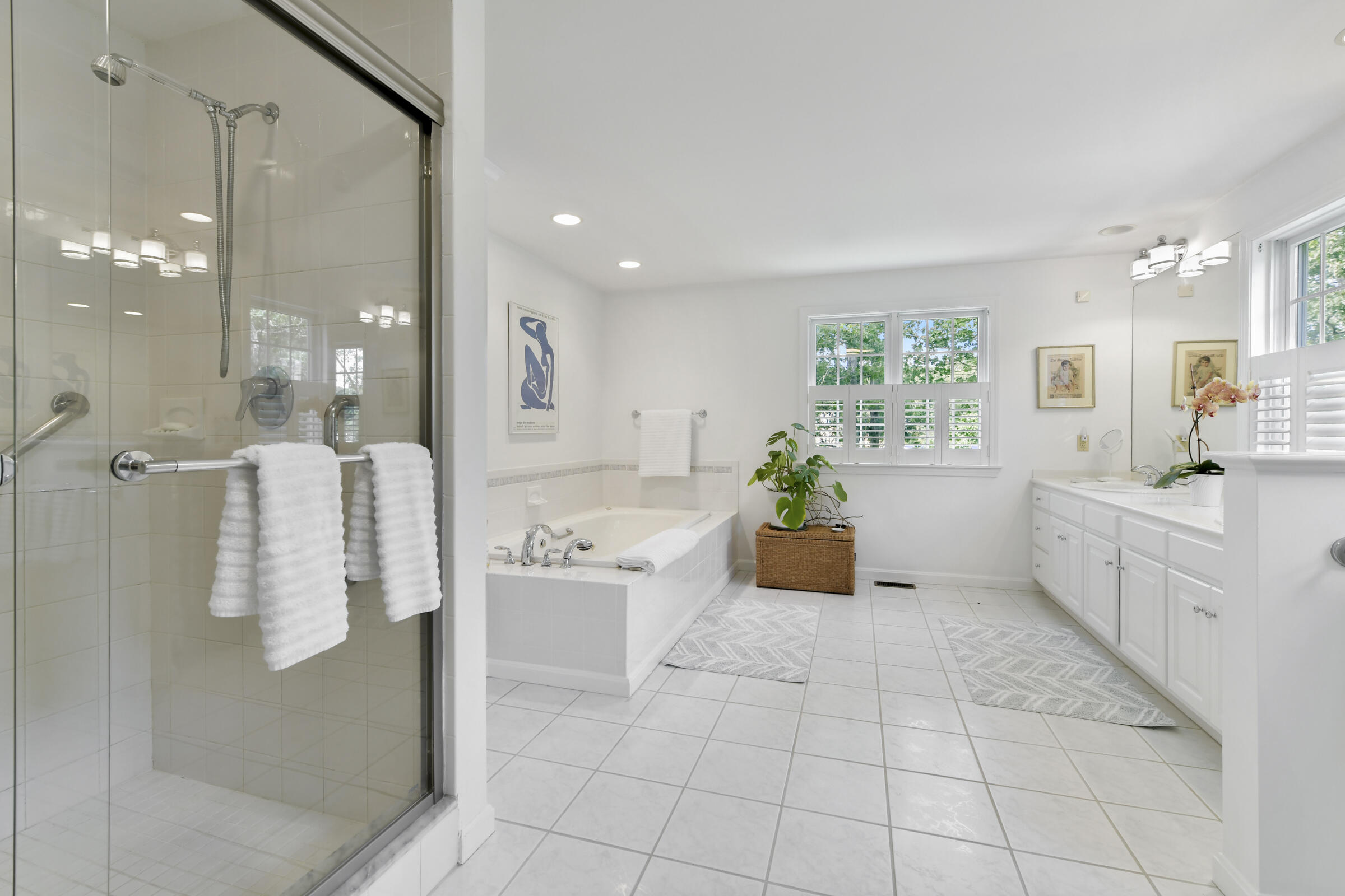 175 Starboard Lane Osterville, MA 02655 - Photo 31 of 39 a large white kitchen with a refrigerator a oven a sink and a large window