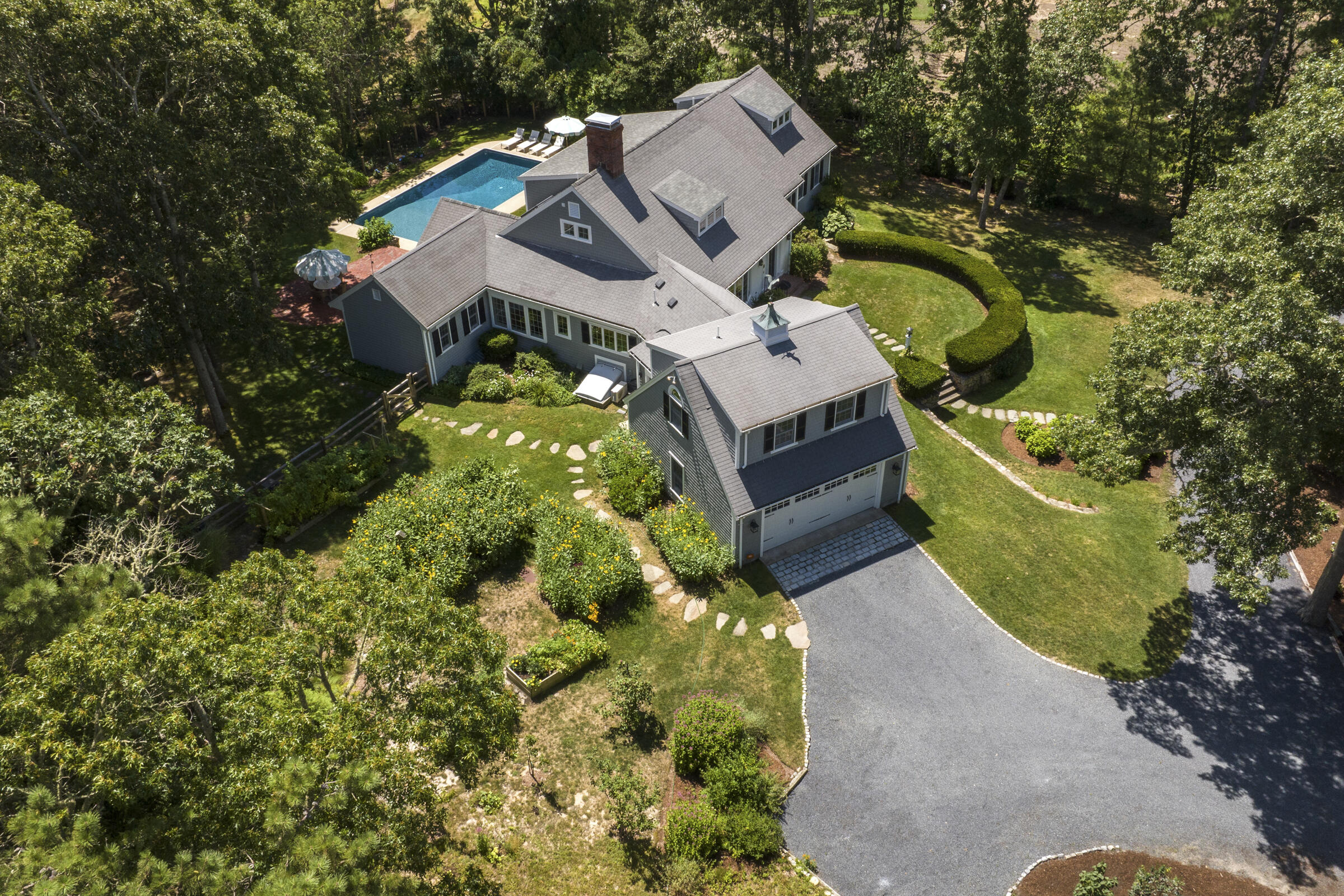 175 Starboard Lane Osterville, MA 02655 - Photo 4 of 39 an aerial view of a house with a garden