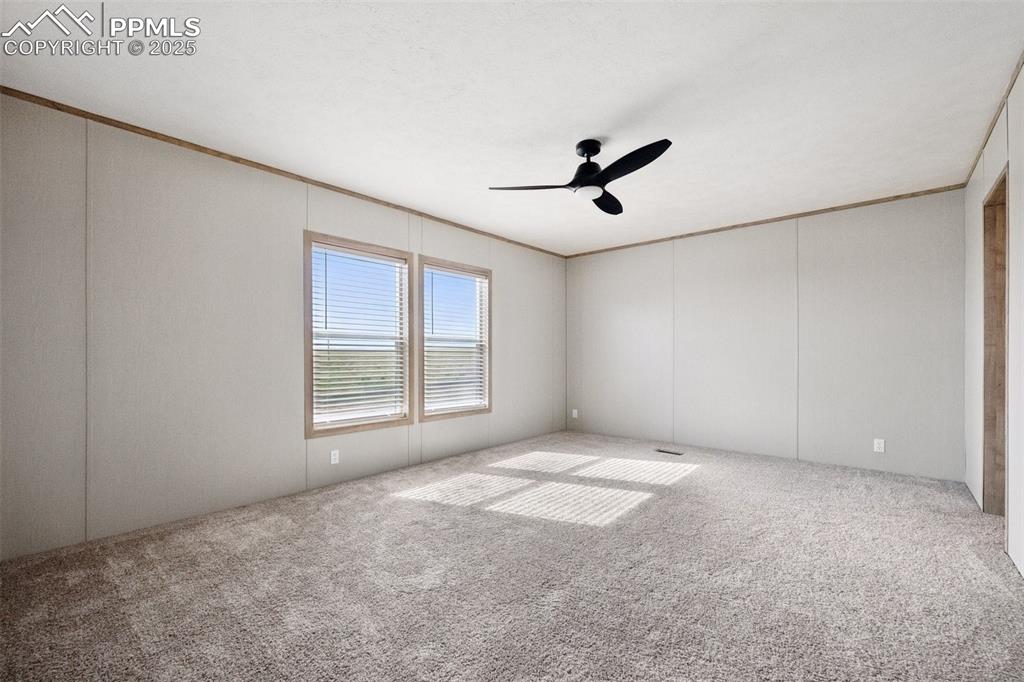 30495 Darroll Drive Yoder, CO 80864 - Photo 11 of 34 a view of an empty room with a window