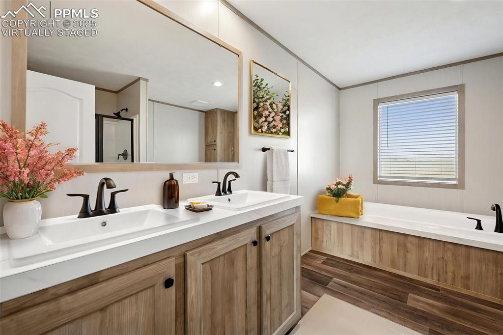30495 Darroll Drive Yoder, CO 80864 - Photo 14 of 34 a bathroom with a sink and a bathtub