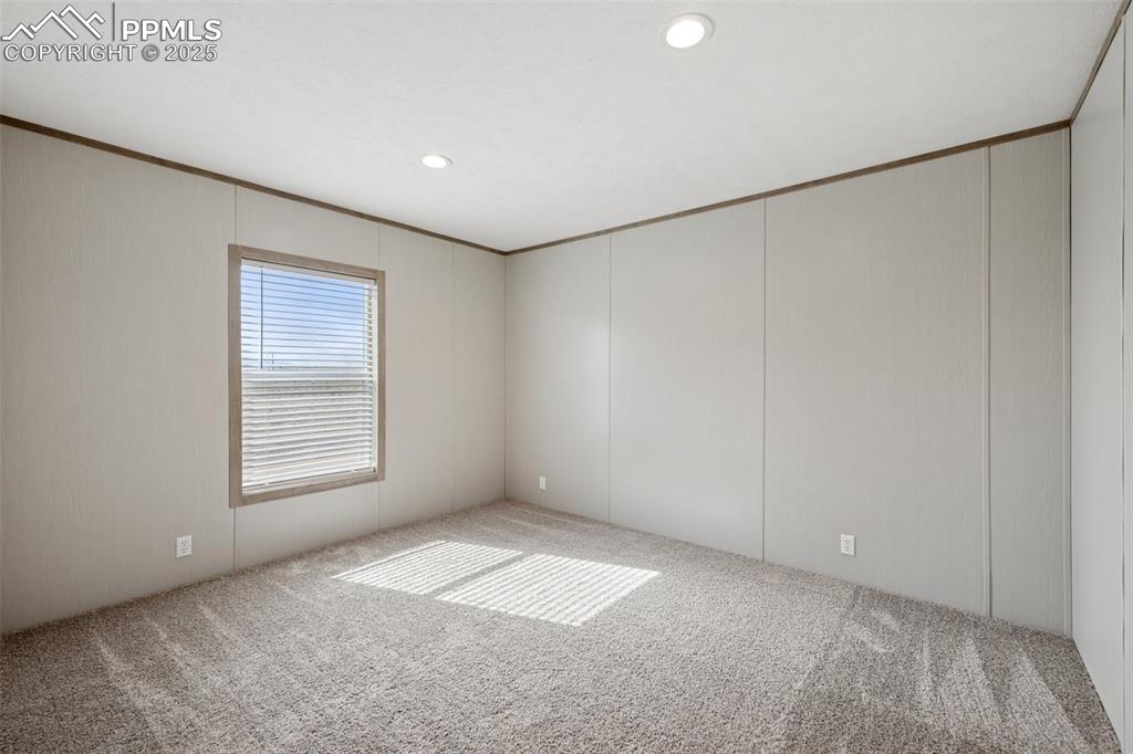 30495 Darroll Drive Yoder, CO 80864 - Photo 20 of 34 a view of an empty room with a window