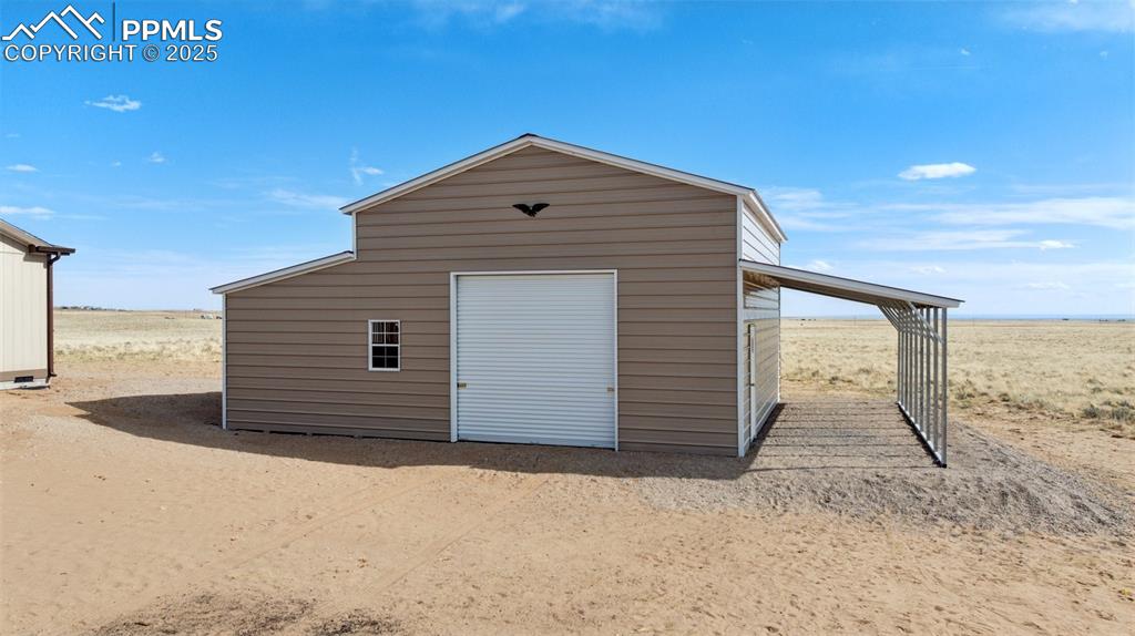 30495 Darroll Drive Yoder, CO 80864 - Photo 2 of 34 a front view of house