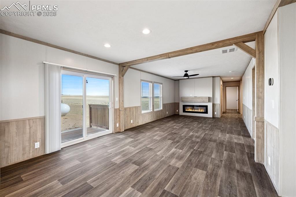 30495 Darroll Drive Yoder, CO 80864 - Photo 31 of 34 a view of livingroom with hardwood floor and a ceiling fan