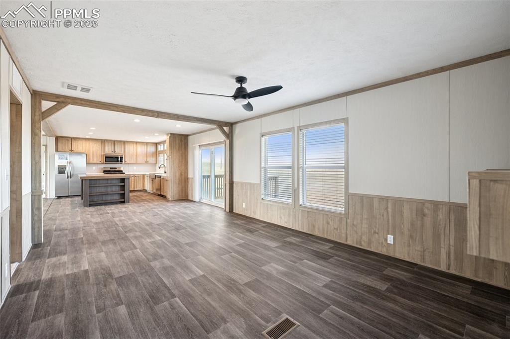 30495 Darroll Drive Yoder, CO 80864 - Photo 32 of 34 a view of livingroom with hardwood floor and a ceiling fan