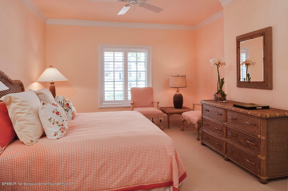1630 Lands End Road Manalapan, FL 33462 - Photo 11 of 19 a bedroom with bed and window