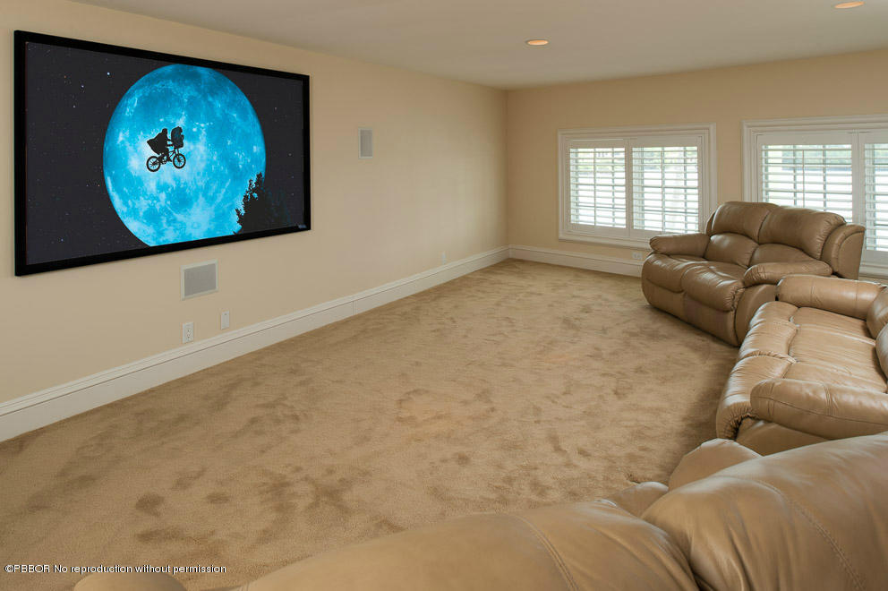 1630 Lands End Road Manalapan, FL 33462 - Photo 16 of 19 a living room with furniture and wall paintings