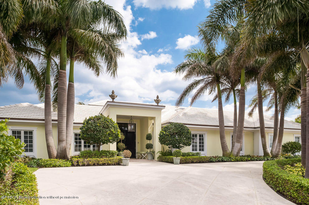 1630 Lands End Road Manalapan, FL 33462 - Photo 18 of 19 a front view of house with yard and green space