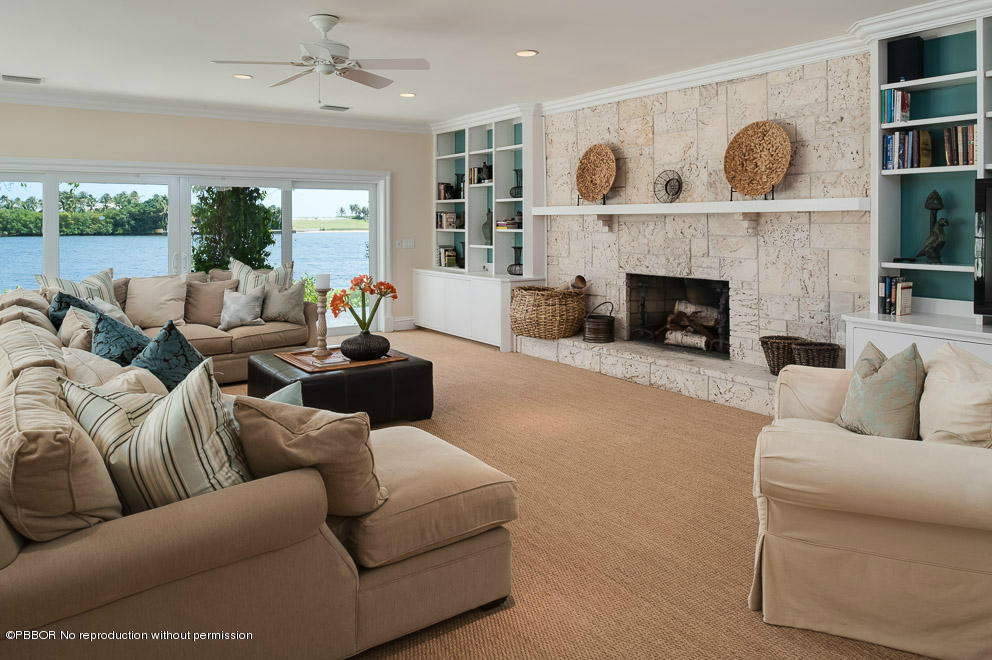 1630 Lands End Road Manalapan, FL 33462 - Photo 7 of 19 a living room with furniture and a fireplace