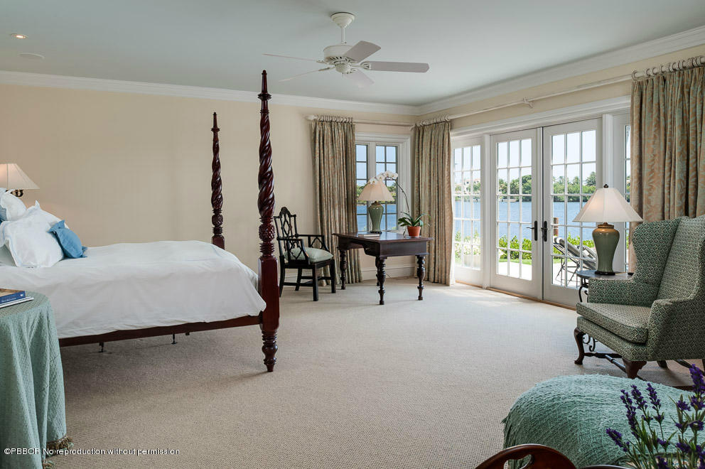 1630 Lands End Road Manalapan, FL 33462 - Photo 8 of 19 a living room with furniture and a large window