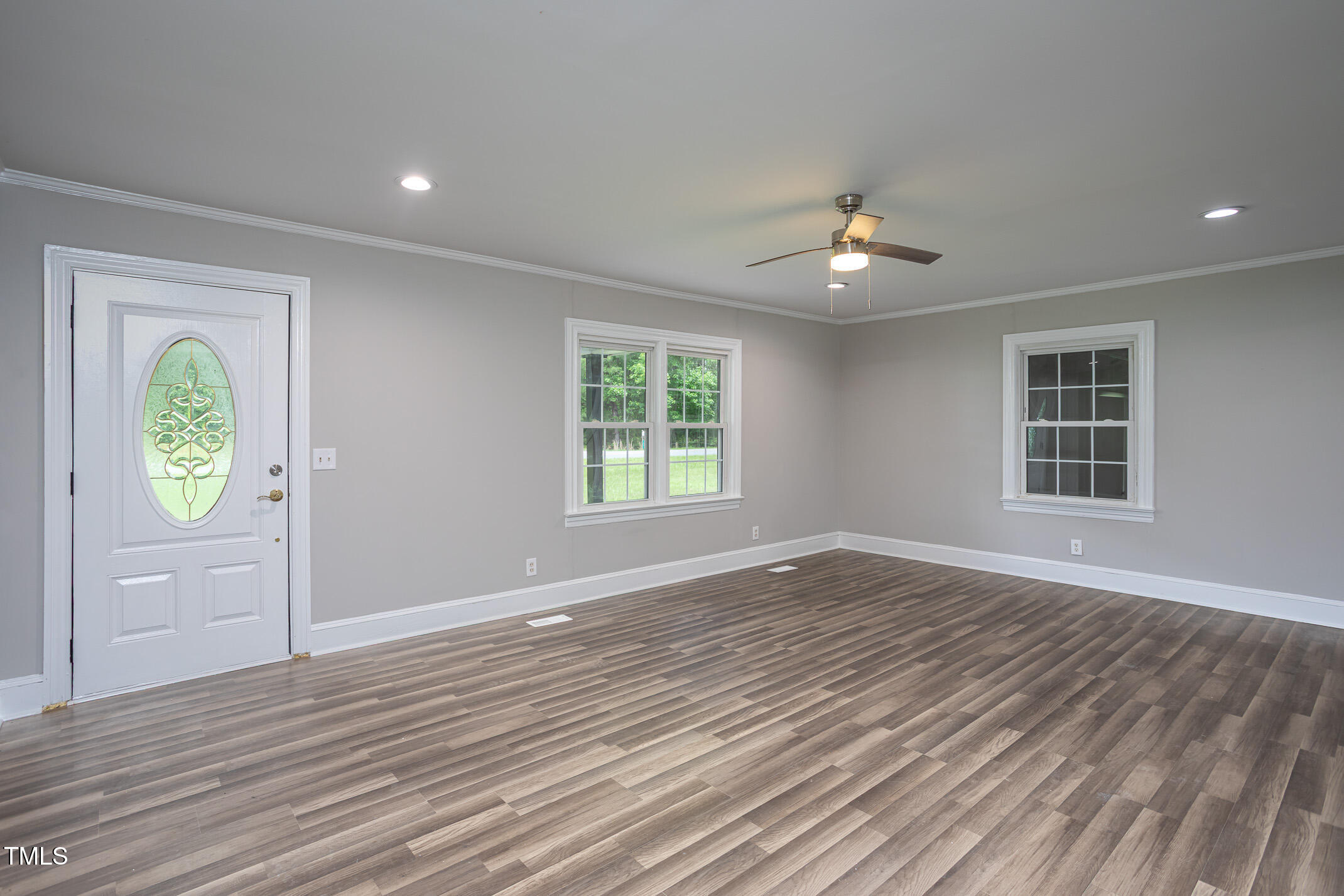 1067 Thompson Road Four Oaks, NC 27524 - Photo 8 of 36 Living Room w/ Ceiling Fan