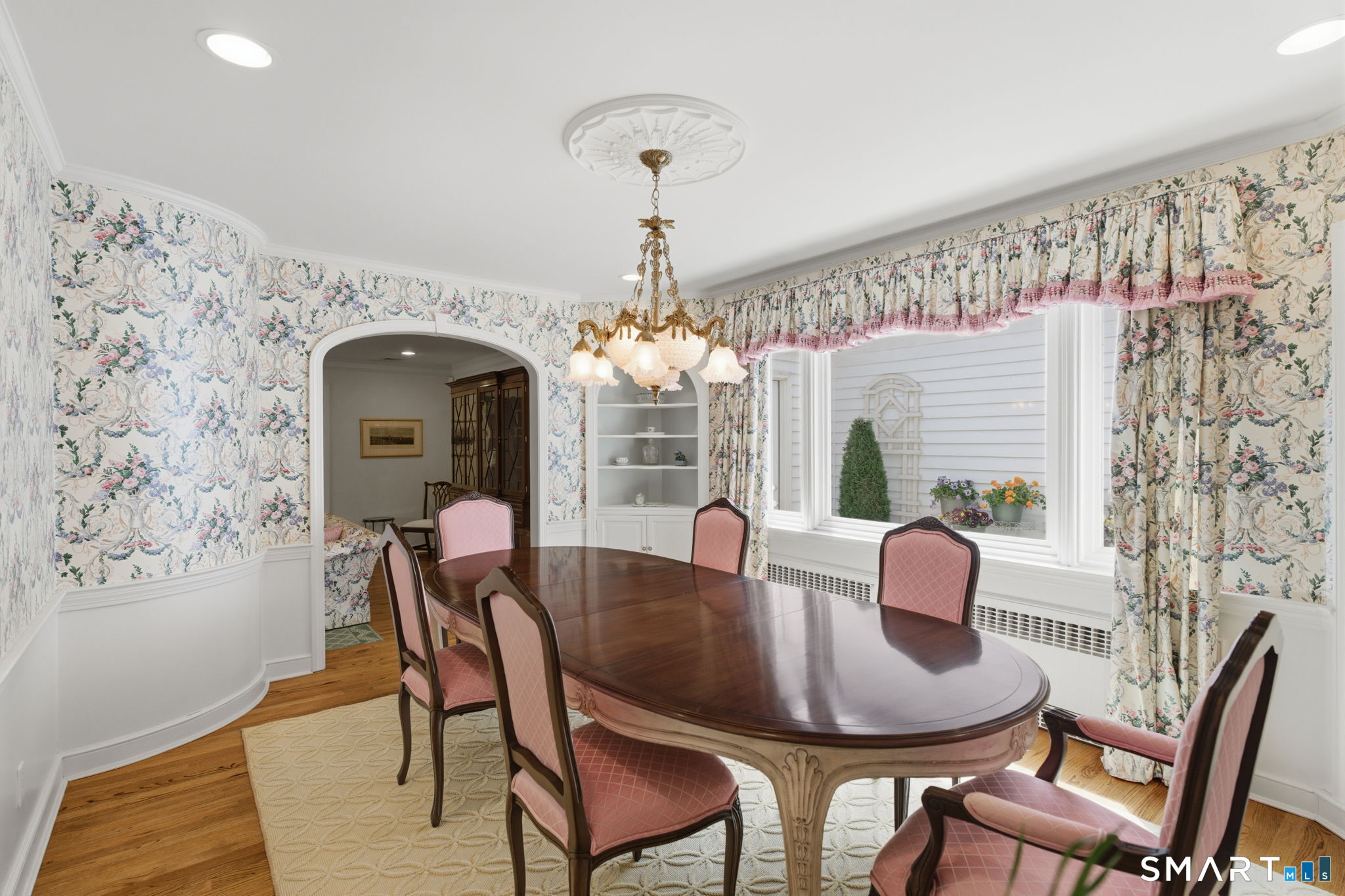 25 Norwood Road West Hartford, CT 06117 - Photo 12 of 40 a view of a dining room with furniture window and wooden floor