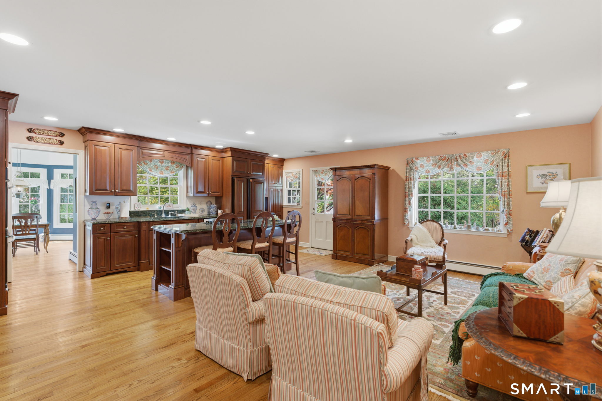 25 Norwood Road West Hartford, CT 06117 - Photo 14 of 40 a living room with fireplace furniture and a large window