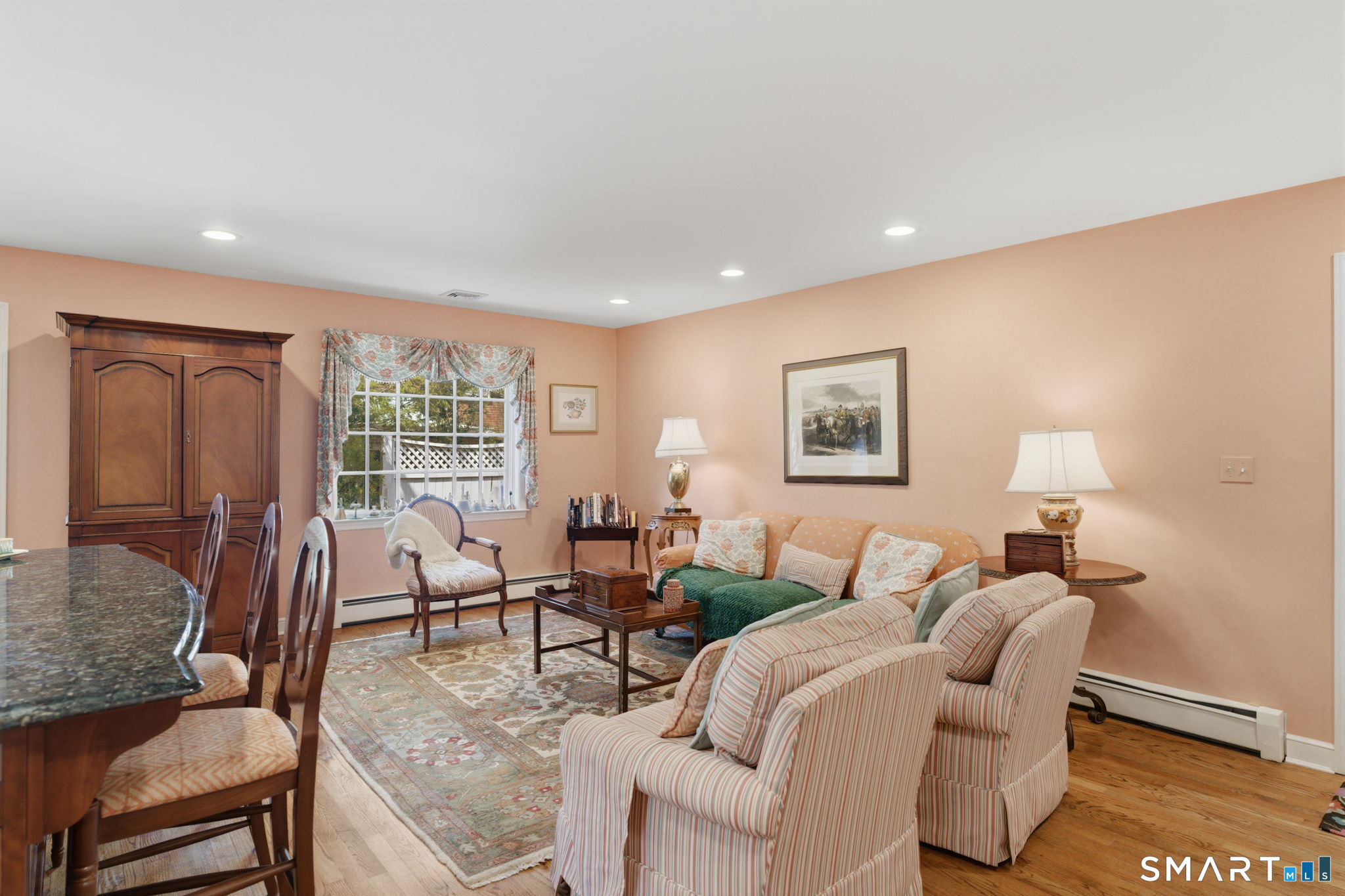 25 Norwood Road West Hartford, CT 06117 - Photo 16 of 40 a living room with furniture and a lamp