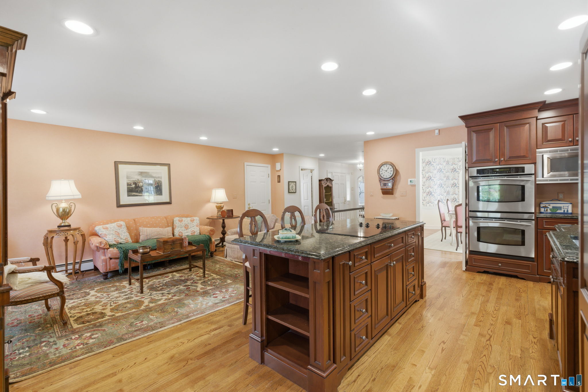 25 Norwood Road West Hartford, CT 06117 - Photo 17 of 40 a living room with furniture and a flat screen tv