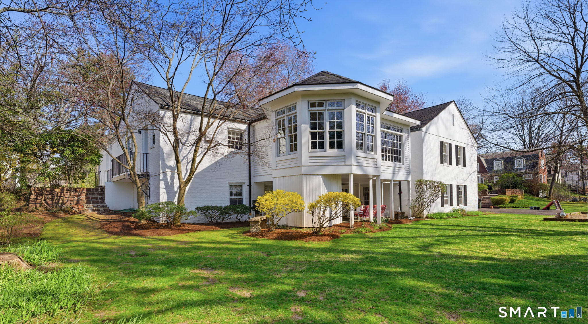 25 Norwood Road West Hartford, CT 06117 - Photo 2 of 40 a front view of a house with a yard