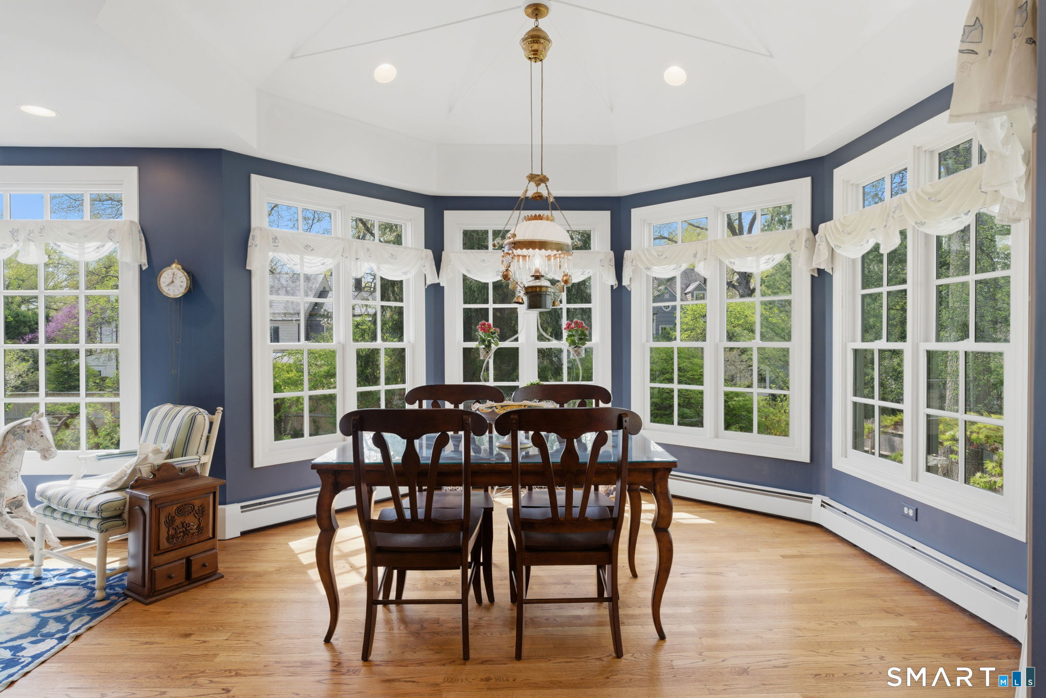 25 Norwood Road West Hartford, CT 06117 - Photo 21 of 40 a view of a dining room with furniture window and outside view