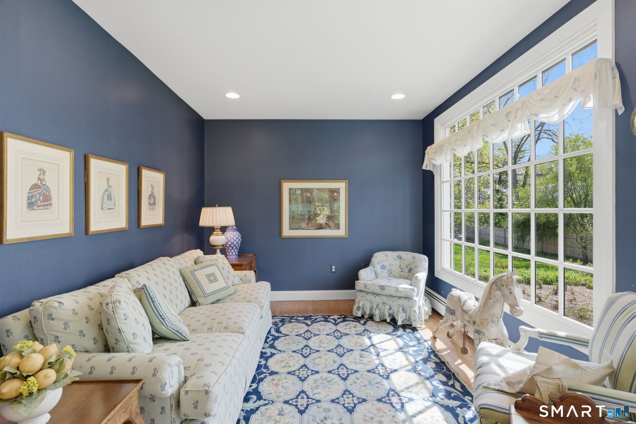 25 Norwood Road West Hartford, CT 06117 - Photo 23 of 40 a living room with furniture and a large window