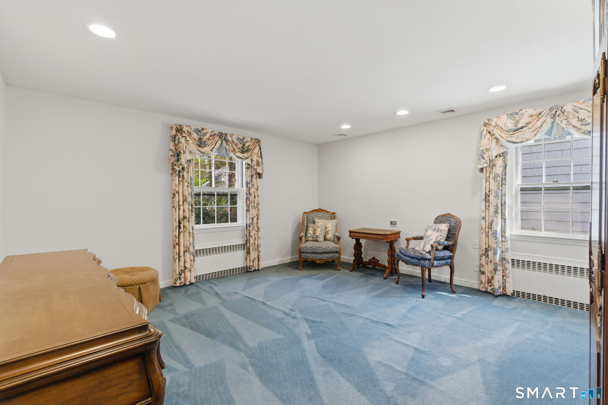 25 Norwood Road West Hartford, CT 06117 - Photo 25 of 40 a living room with furniture and a window