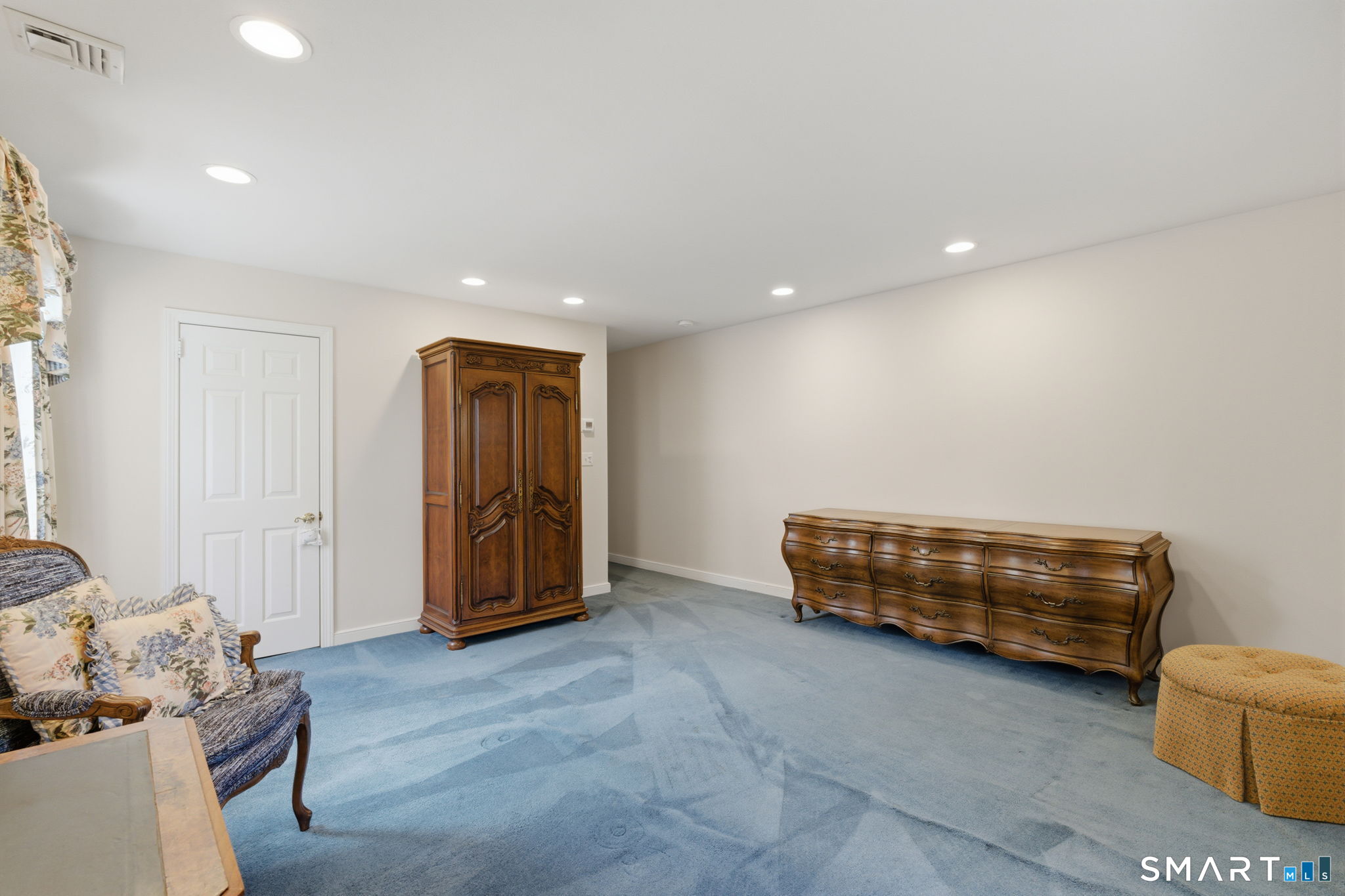 25 Norwood Road West Hartford, CT 06117 - Photo 26 of 40 a room with furniture and wooden floor