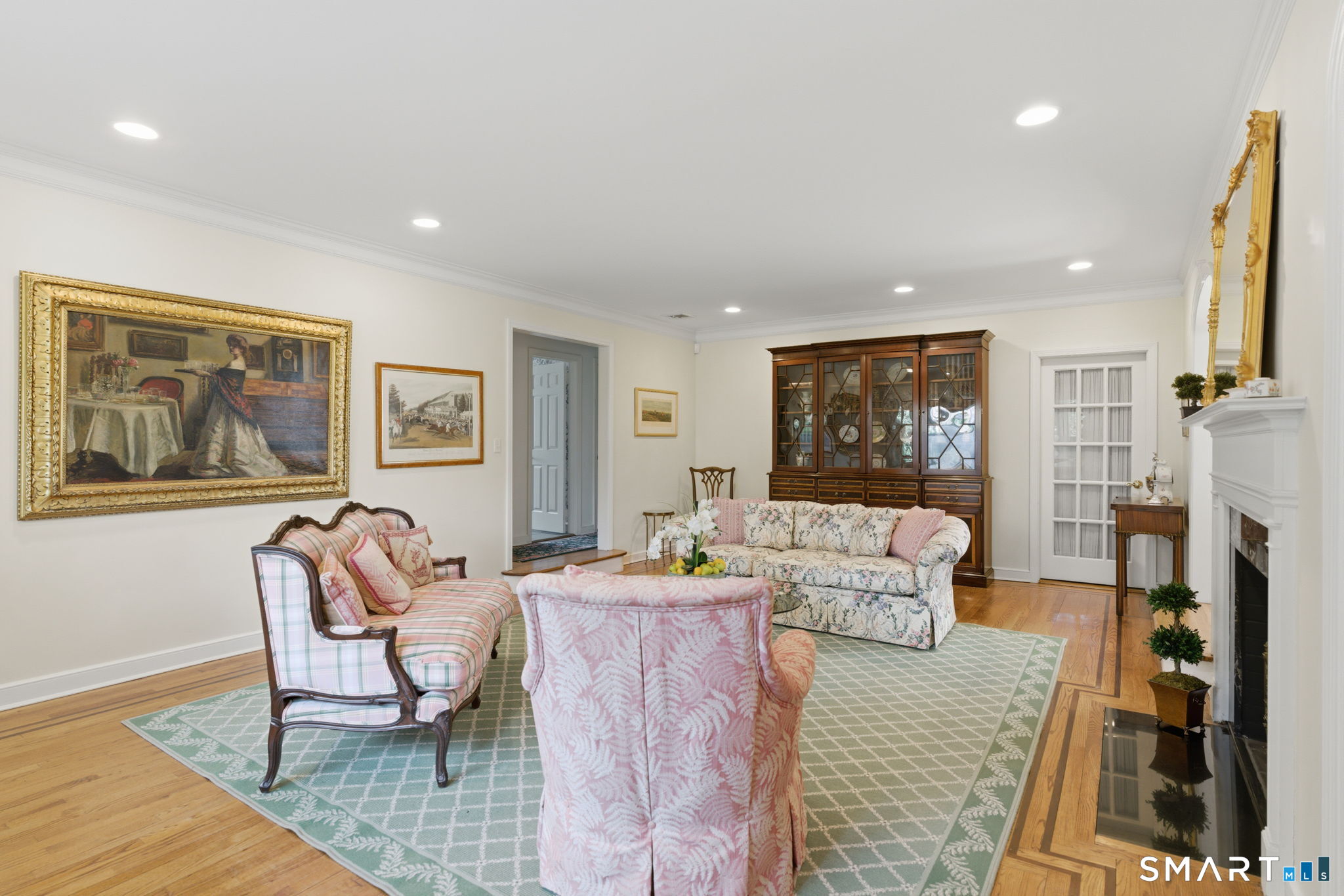 25 Norwood Road West Hartford, CT 06117 - Photo 5 of 40 a living room with furniture and a fireplace