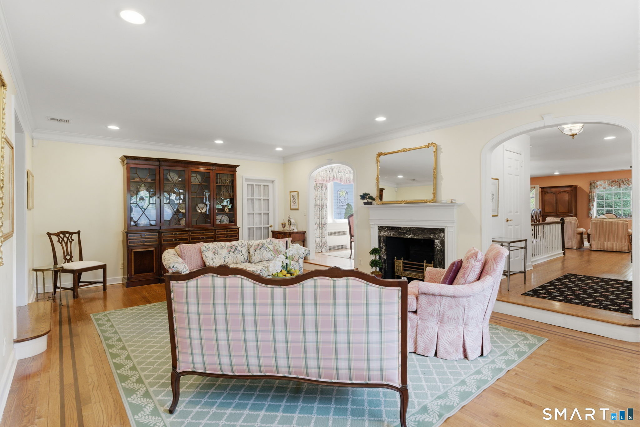 25 Norwood Road West Hartford, CT 06117 - Photo 6 of 40 a living room with furniture fireplace and rug