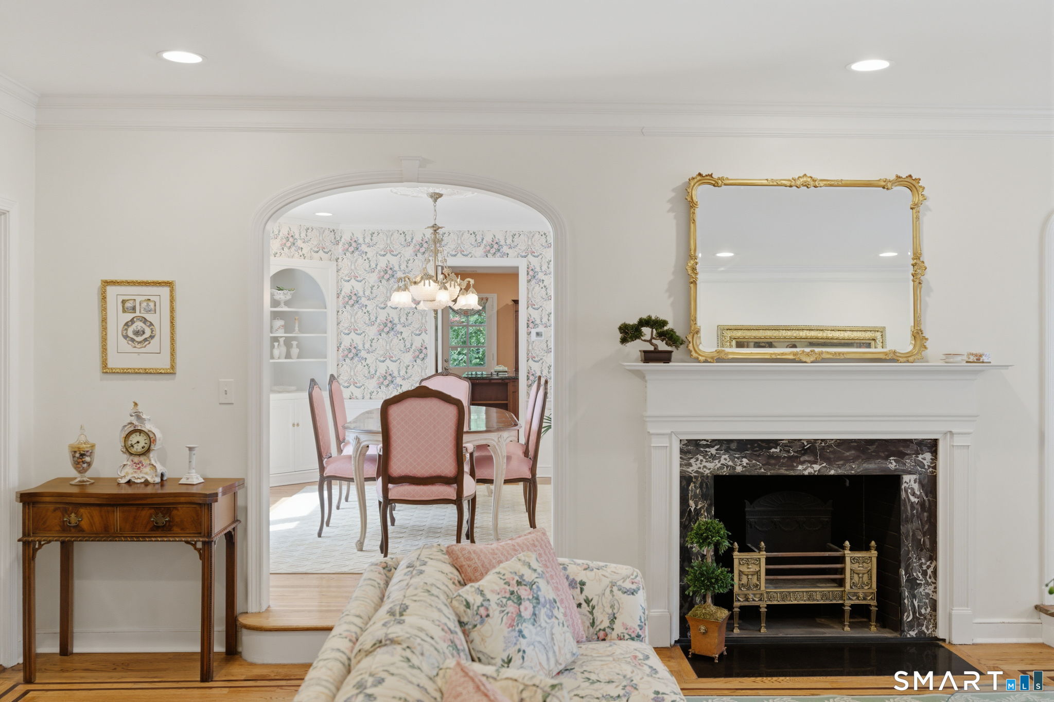 25 Norwood Road West Hartford, CT 06117 - Photo 10 of 40 a living room with furniture and a fireplace