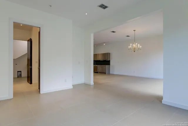 a bathroom with a sink double vanity and a mirror