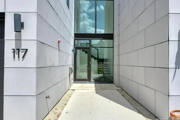 a view of staircase with a rug