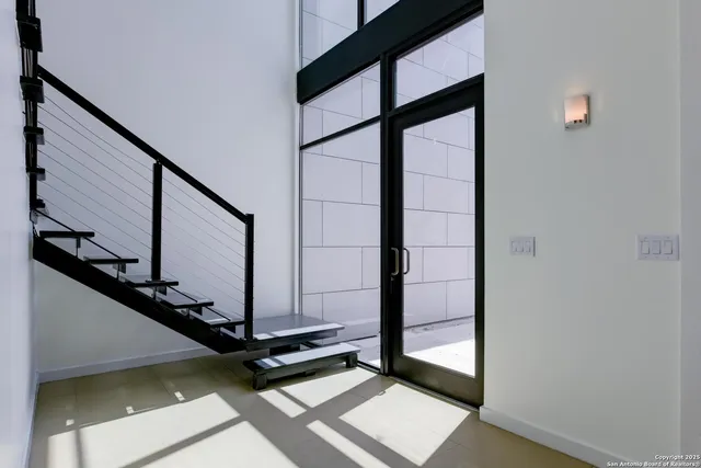 a view of entryway with a front door