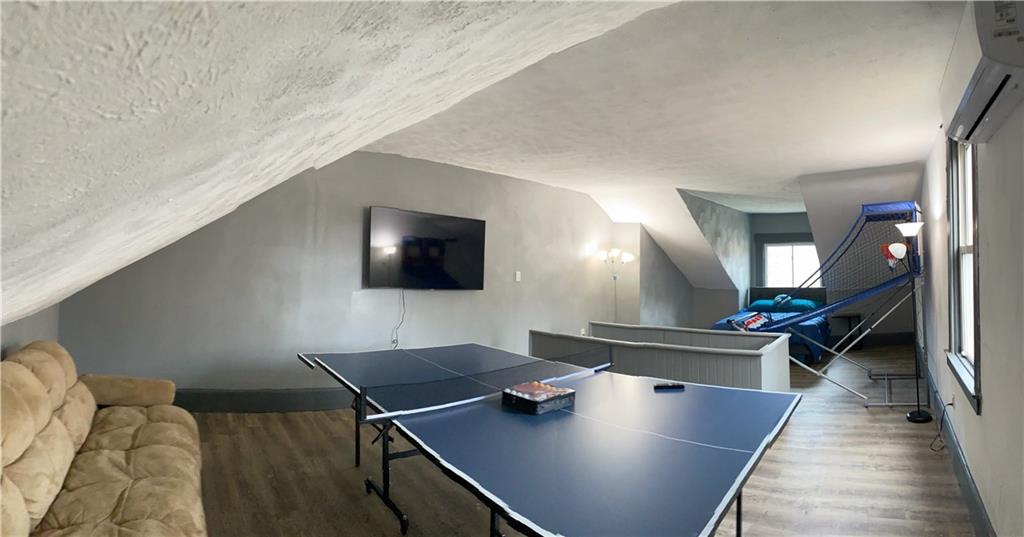 2133 Brighton Road Pittsburgh, PA 15212 - Photo 11 of 17 Finished attic used as additional bedroom/bonus room. Airbnb Photo