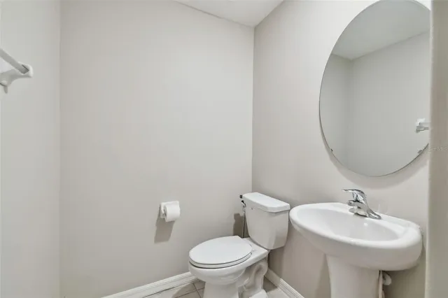 a kitchen with stainless steel appliances granite countertop a sink refrigerator and microwave