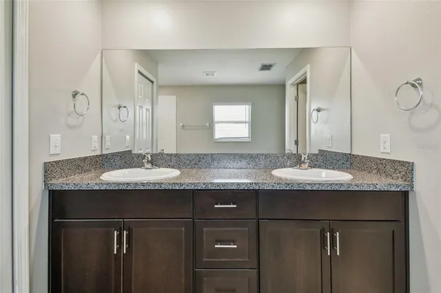 an aerial view of houses with outdoor space