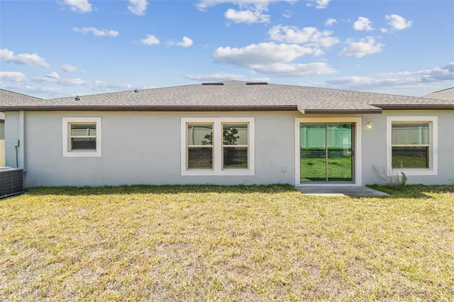 an aerial view of a pool patio swimming pool and outdoor space