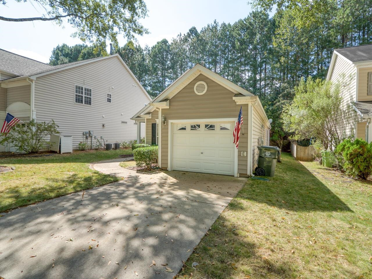 8425 Lunar Stone Place Raleigh, NC 27613 - Photo 26 of 34 a view of a house with a yard