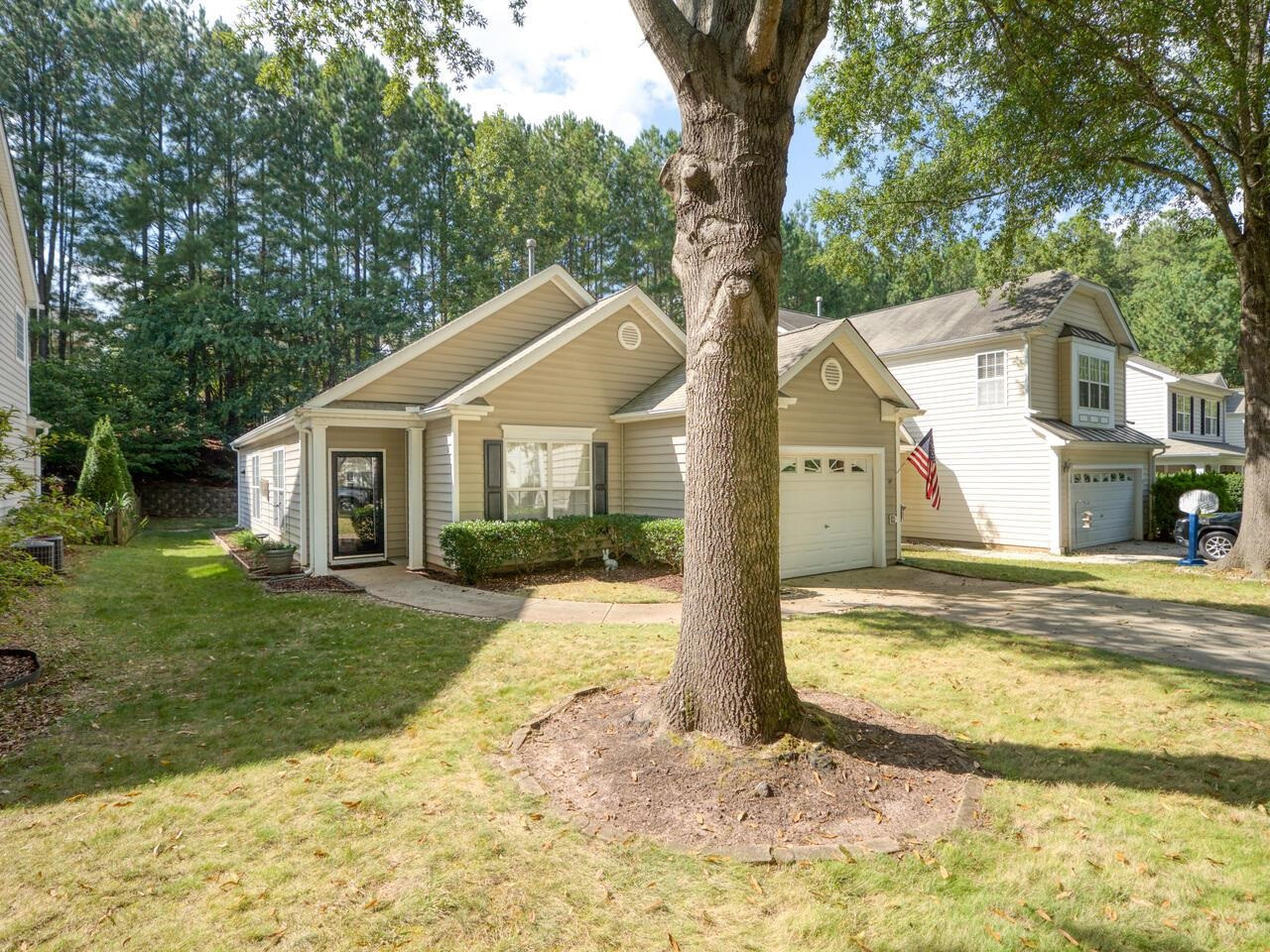 8425 Lunar Stone Place Raleigh, NC 27613 - Photo 28 of 34 a view of a house with a yard