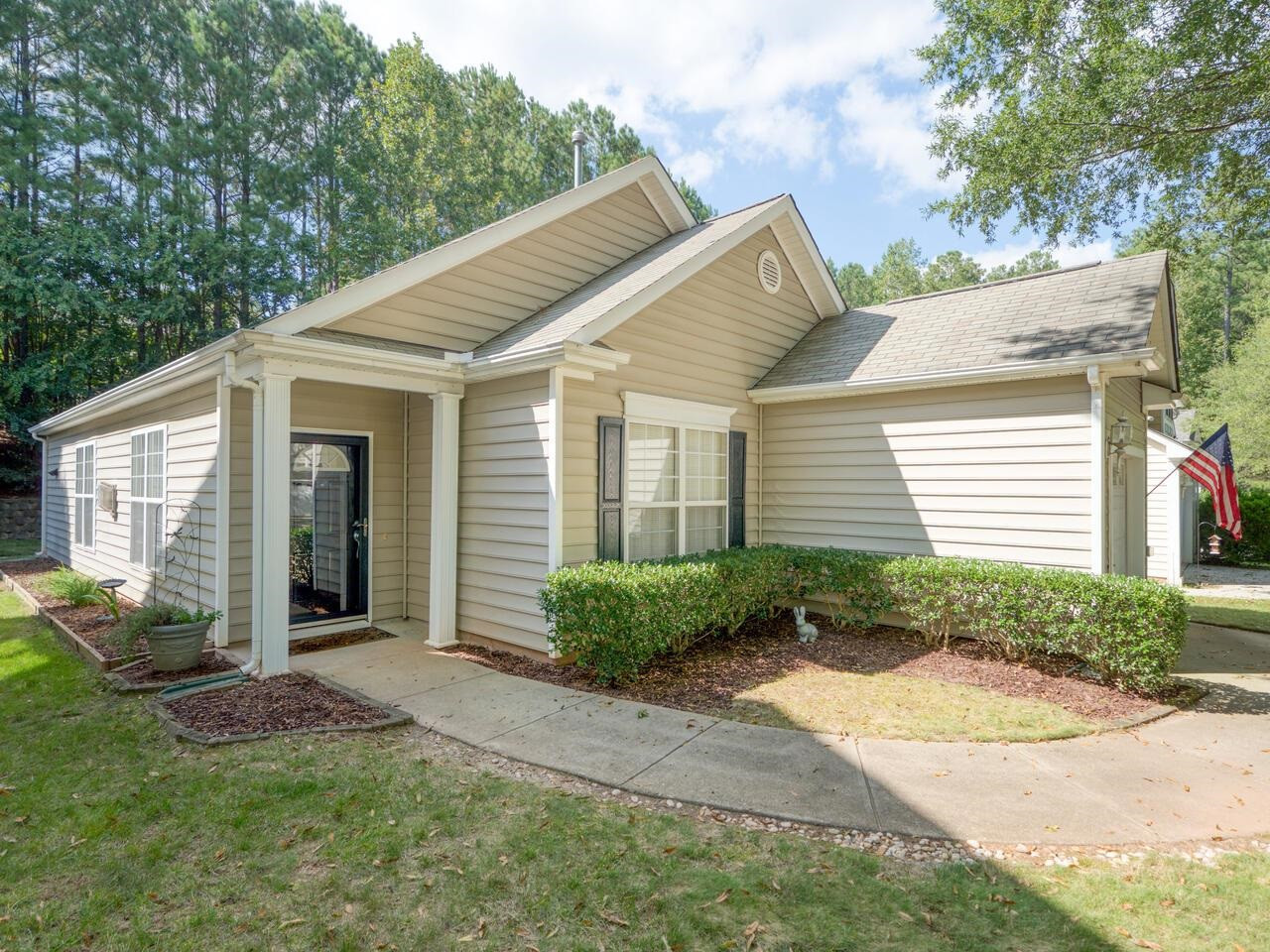 8425 Lunar Stone Place Raleigh, NC 27613 - Photo 29 of 34 a view of a house with a yard