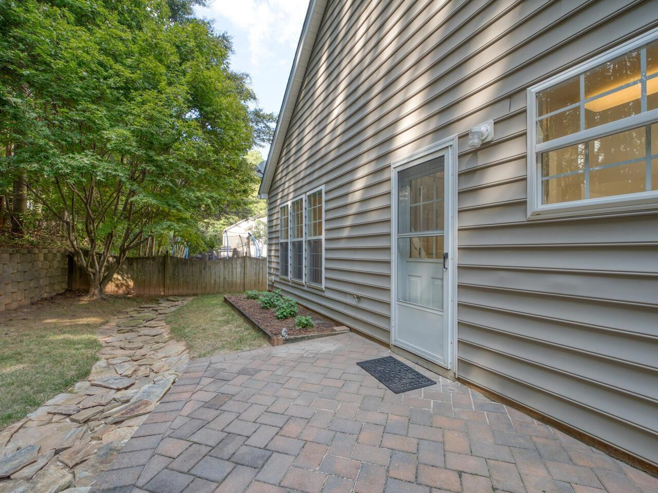 8425 Lunar Stone Place Raleigh, NC 27613 - Photo 32 of 34 a view of outdoor space and yard