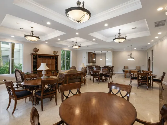 an aerial view of multiple houses with yard