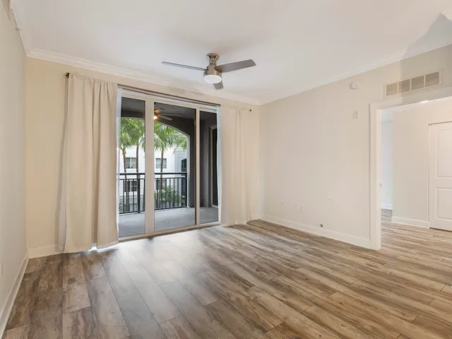 a kitchen with stainless steel appliances granite countertop a stove microwave and sink