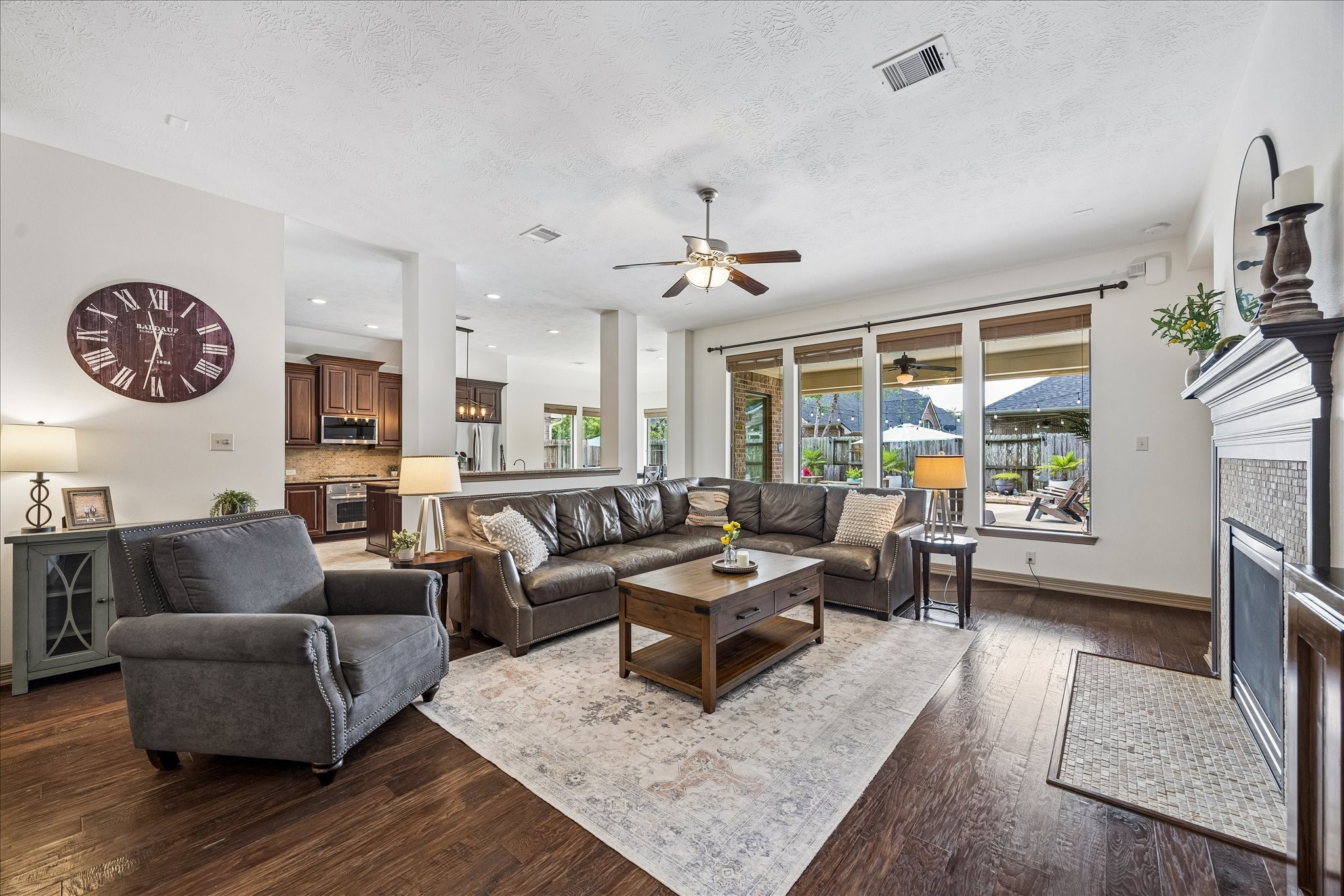 28211 Rippling Brook Lane Fulshear, TX 77441 - Photo 6 of 45 a living room with furniture and a large window