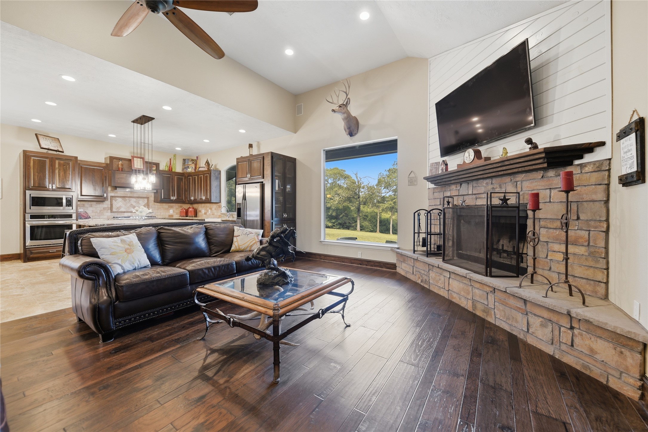 8595 Jared Road Bellville, TX 77418 - Photo 8 of 45 Living room open to kitchen