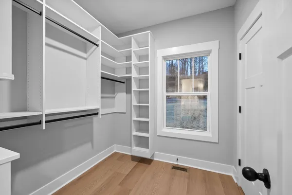 a bathroom with a tub and shower