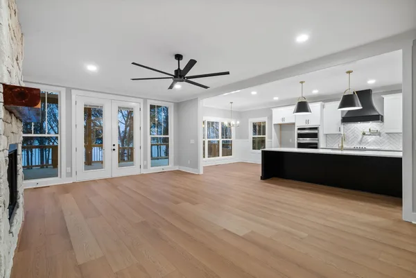 a view of kitchen with cabinets and wooden floor