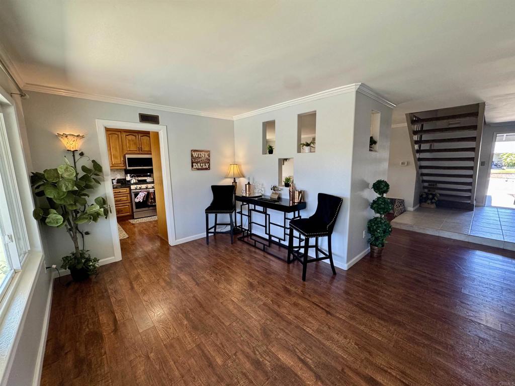 12443 Danes Road Poway, CA 92064 - Photo 6 of 44 a living room with furniture and a wooden floor