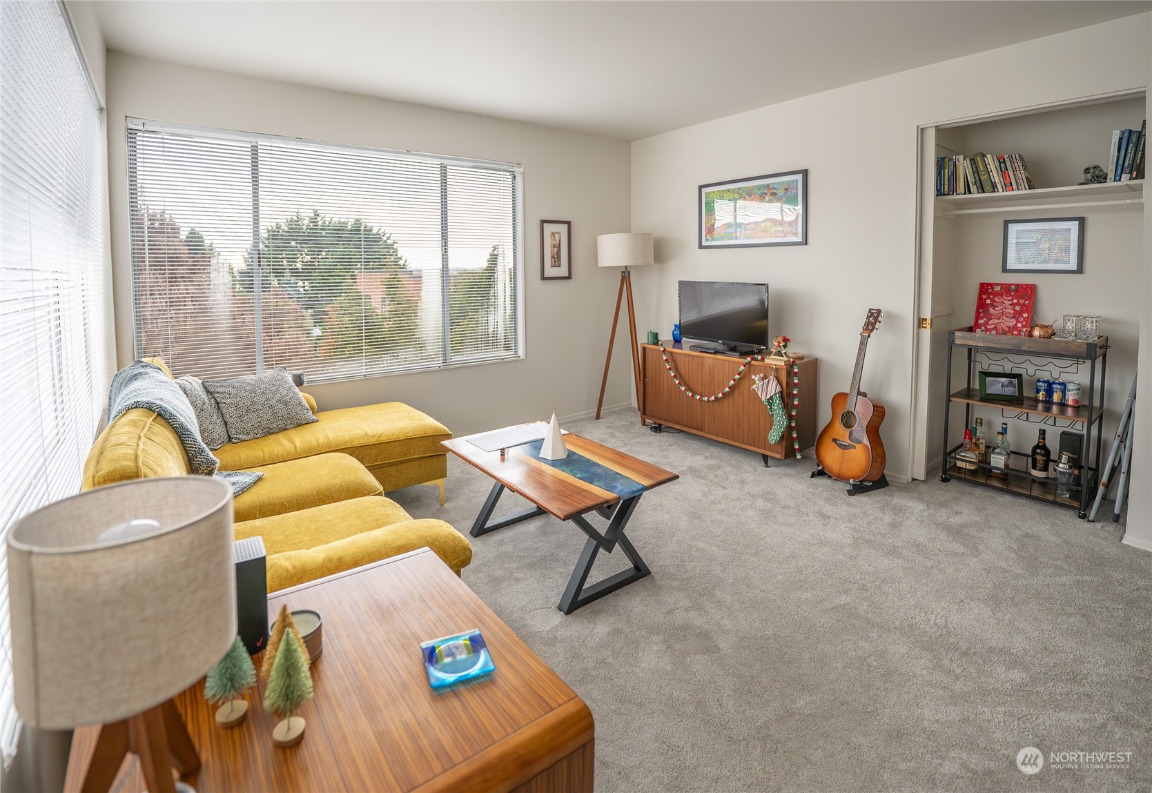 15 Ward Street Seattle, WA 98109 - Photo 16 of 17 a living room with furniture and a flat screen tv