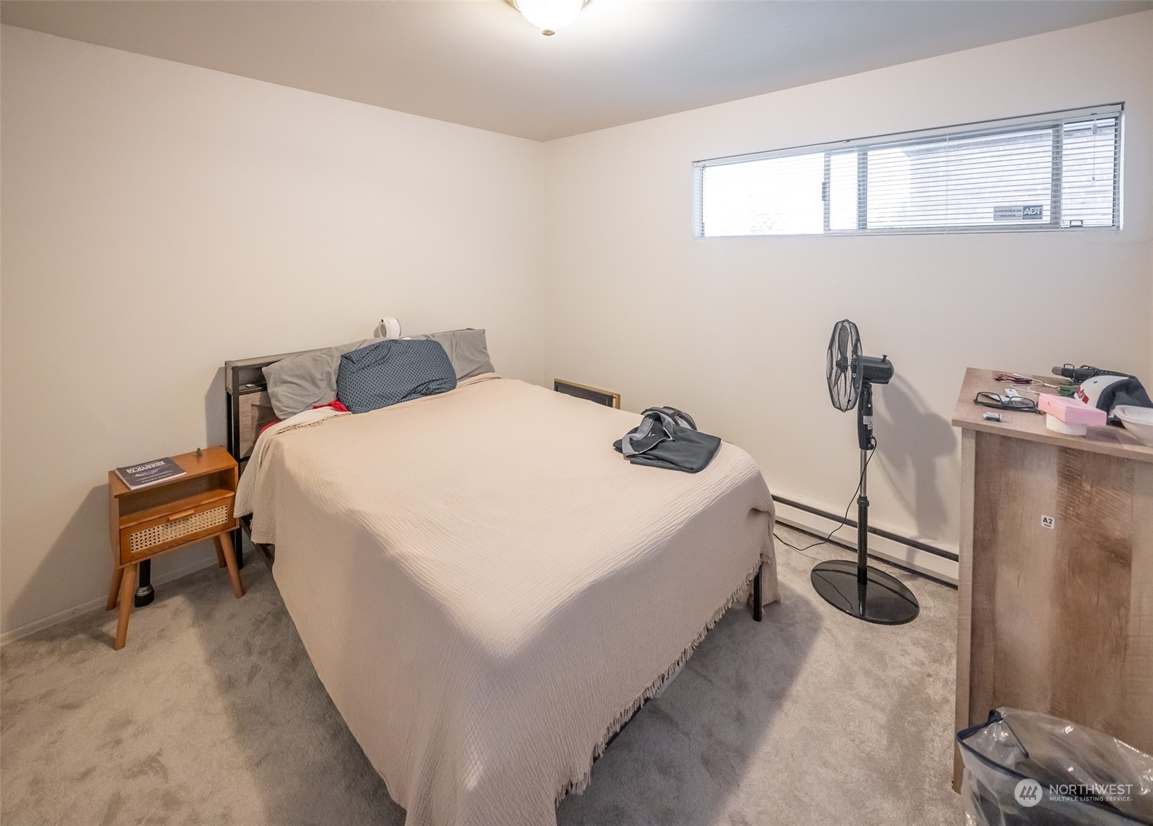 15 Ward Street Seattle, WA 98109 - Photo 17 of 17 a bed room with a bed and a chair