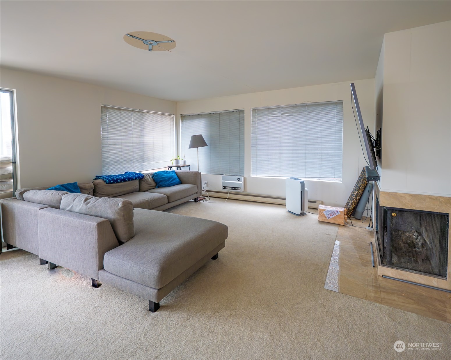 15 Ward Street Seattle, WA 98109 - Photo 8 of 17 a living room with furniture and a window