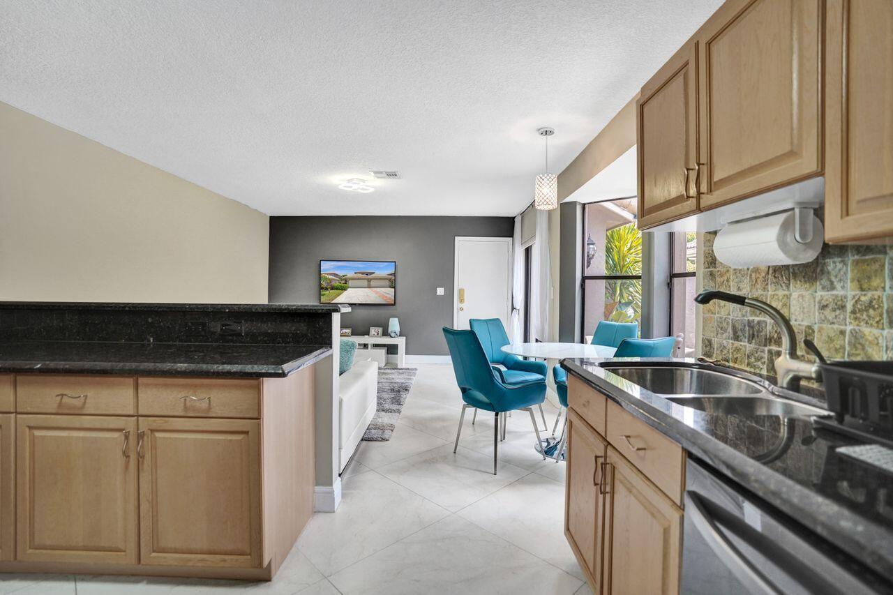 5465 Monterey Circle, Unit D Delray Beach, FL 33484 - Photo 29 of 67 Overlooks The Dining Area